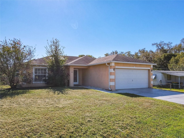 ranch-style home with a front yard and a garage