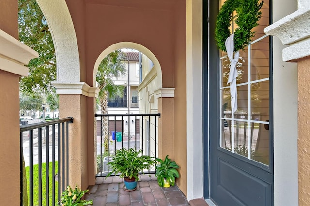 doorway to property featuring a balcony