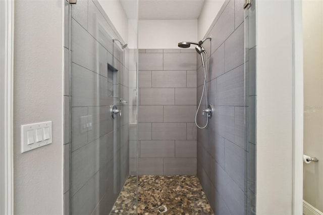 bathroom featuring an enclosed shower