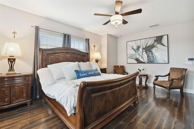 bedroom with ceiling fan and dark wood-type flooring