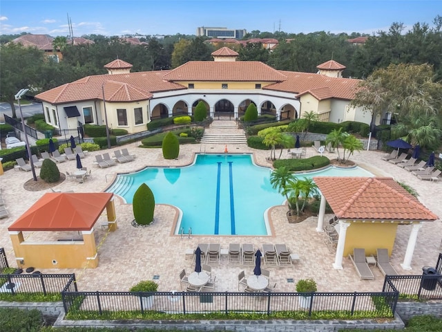 view of pool featuring a patio area