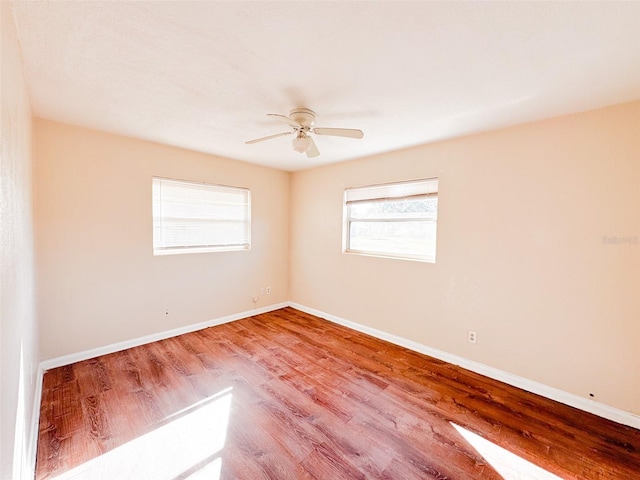 spare room with ceiling fan and light hardwood / wood-style floors