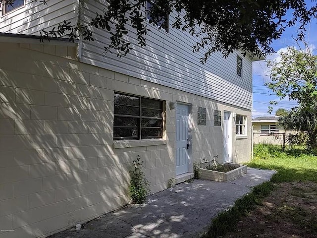 view of home's exterior featuring a patio