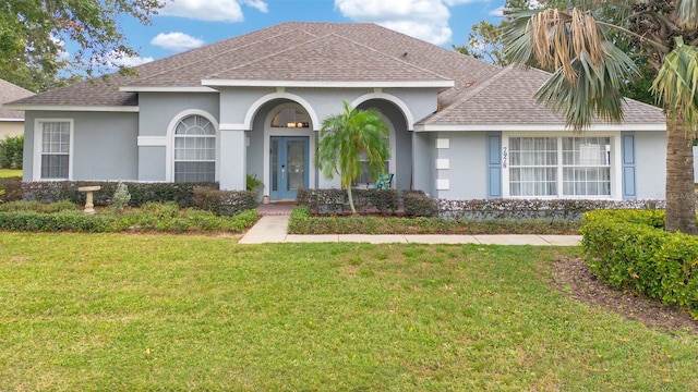 view of front of home with a front lawn