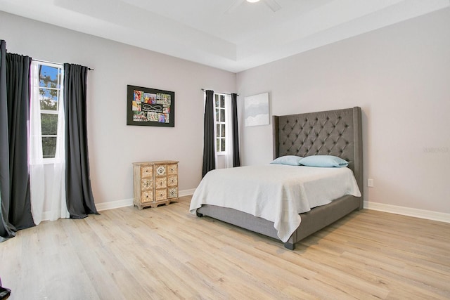 bedroom featuring ceiling fan and light wood-type flooring