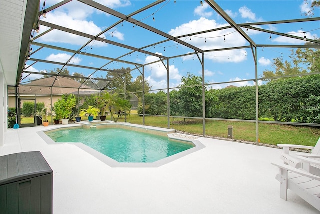 view of pool with a lawn, glass enclosure, and a patio area