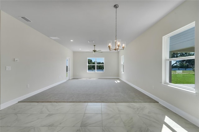 interior space featuring ceiling fan with notable chandelier and light carpet