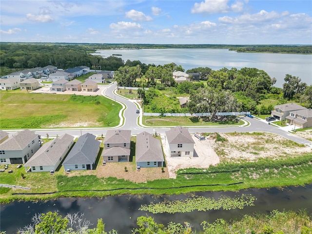 bird's eye view with a water view