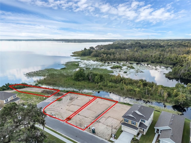 birds eye view of property featuring a water view