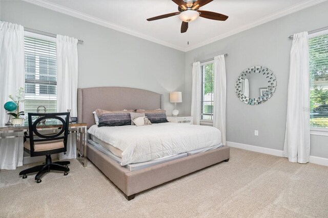 bedroom featuring light carpet, multiple windows, and ceiling fan