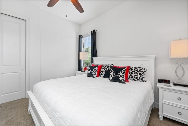 carpeted bedroom with ceiling fan