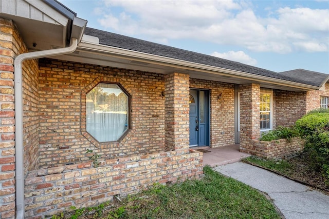 property entrance with covered porch