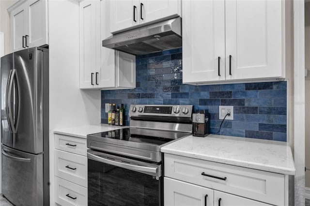 kitchen featuring decorative backsplash, white cabinetry, light stone countertops, and appliances with stainless steel finishes