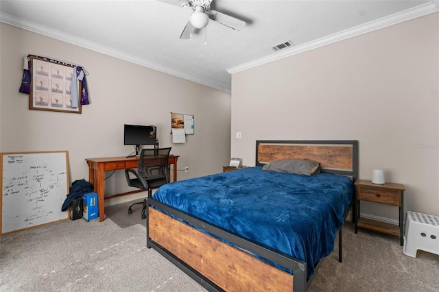 carpeted bedroom featuring ceiling fan and crown molding