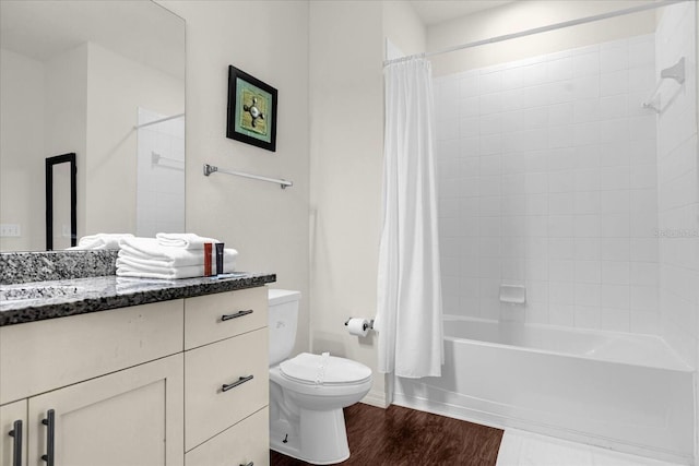 full bathroom with wood-type flooring, vanity, toilet, and shower / bathtub combination with curtain