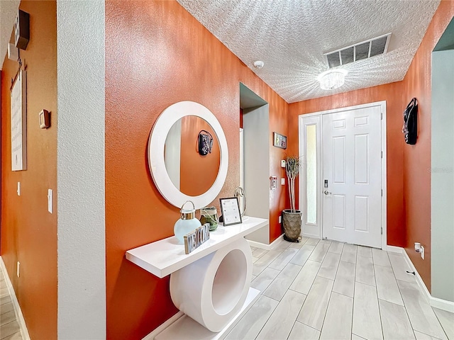 bathroom with a textured ceiling