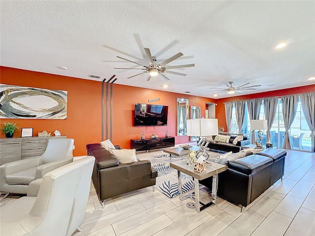 living room featuring a textured ceiling