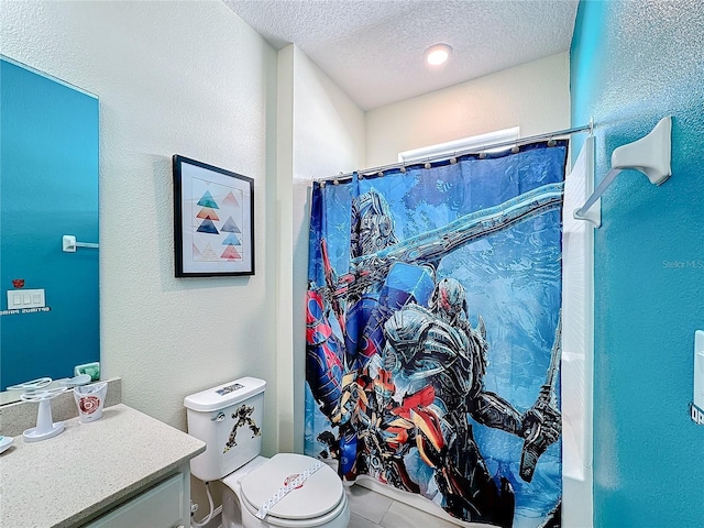 bathroom featuring vanity, a textured ceiling, tile patterned flooring, toilet, and curtained shower