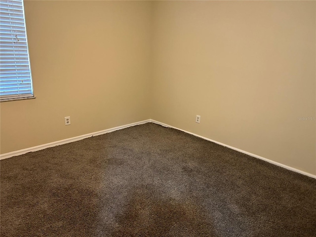 view of carpeted spare room