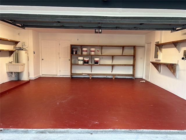 garage with sink and water heater