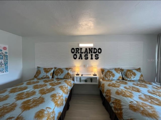 bedroom featuring a textured ceiling