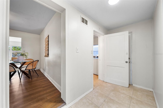 hallway featuring light hardwood / wood-style flooring