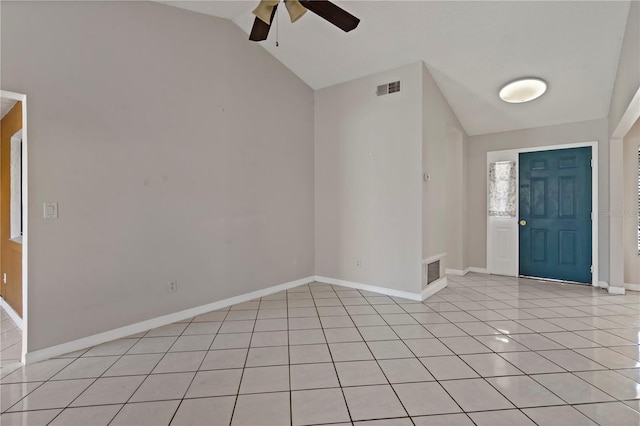 tiled entryway featuring ceiling fan and vaulted ceiling