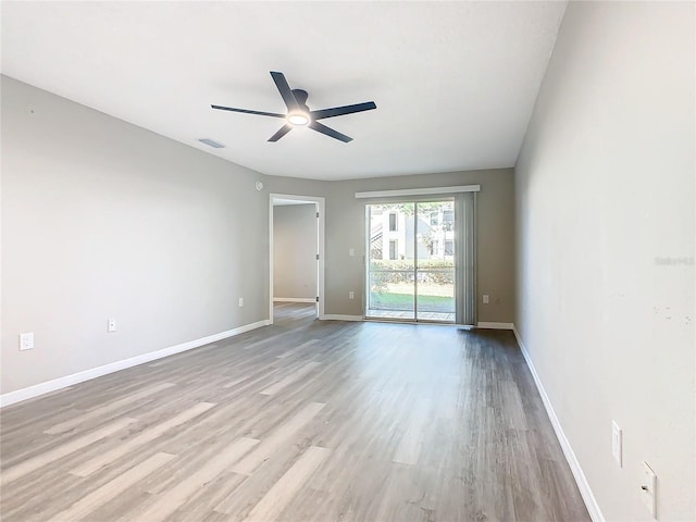 spare room with ceiling fan and light hardwood / wood-style flooring