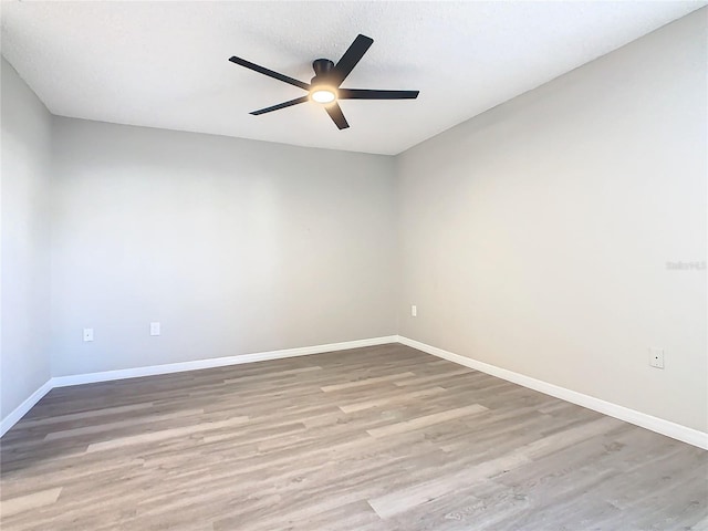 unfurnished room with ceiling fan, light hardwood / wood-style floors, and a textured ceiling