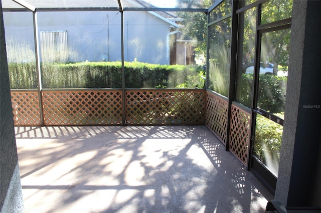 unfurnished sunroom with a healthy amount of sunlight