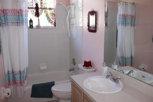 full bathroom featuring shower / tub combo, vanity, and toilet