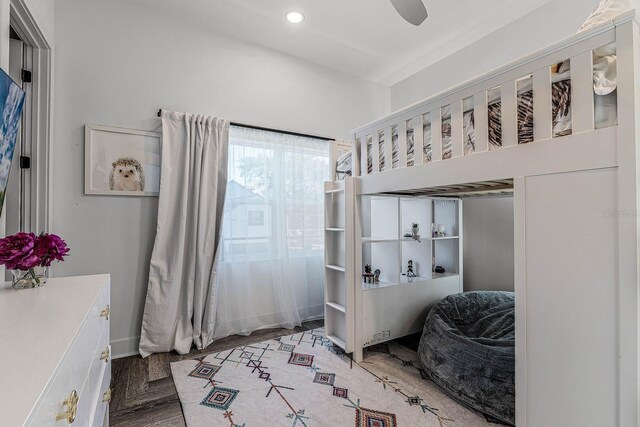 bedroom with ceiling fan and light parquet flooring