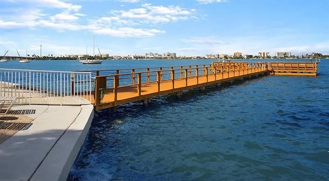 dock area featuring a water view