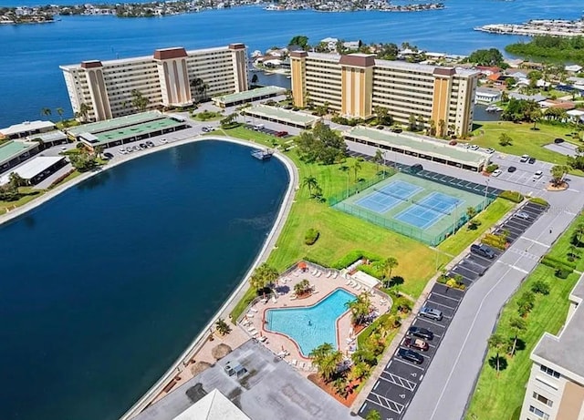 birds eye view of property with a water view