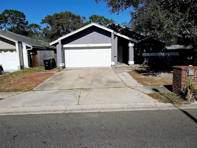 single story home with a garage