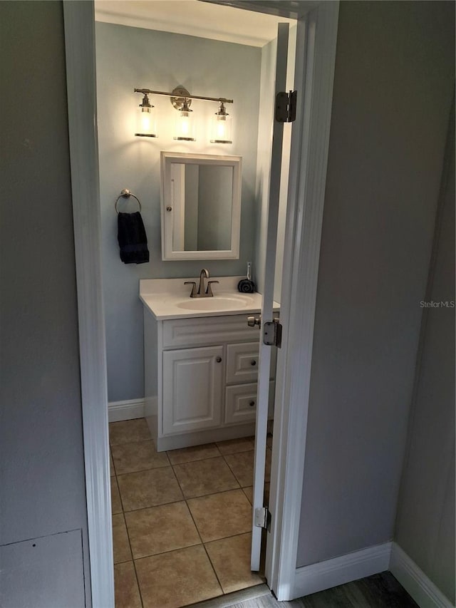 bathroom featuring tile patterned floors and vanity