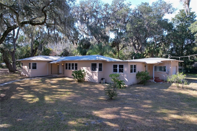 view of front of house with metal roof