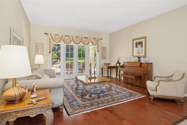 living room featuring wood-type flooring and french doors