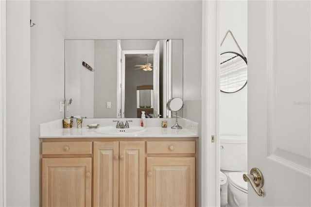 bathroom with vanity and toilet