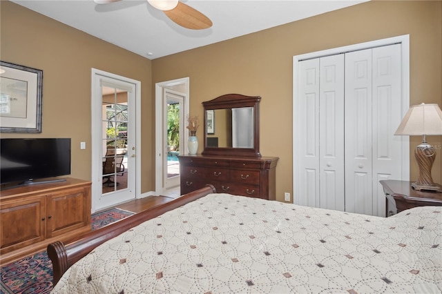 bedroom featuring access to outside, ceiling fan, and a closet