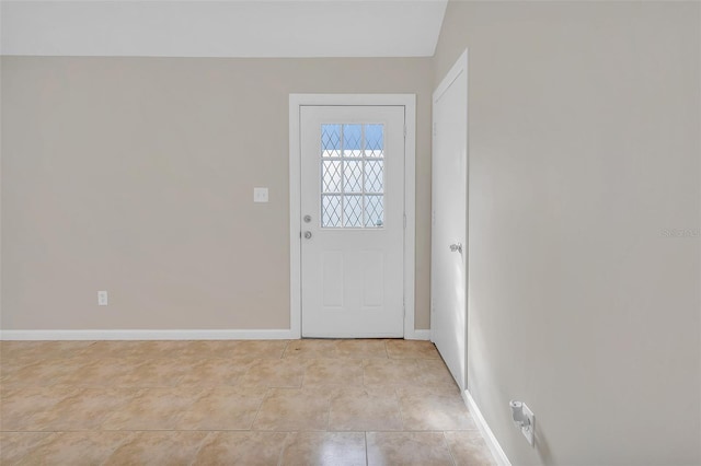 entryway featuring light tile patterned flooring