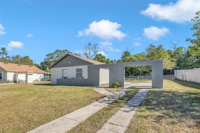 view of front facade with a front lawn