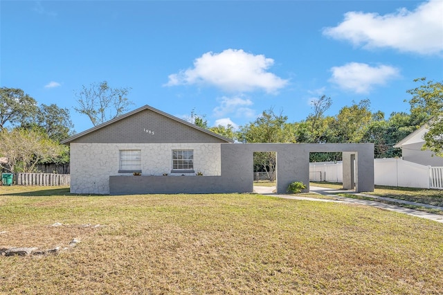 view of front of home with a front yard