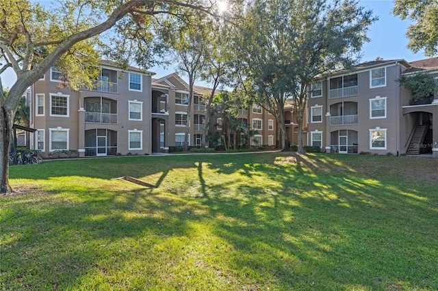 7135 Yacht Basin Ave Unit 237, Orlando, FL 32835 - view of community with a lawn