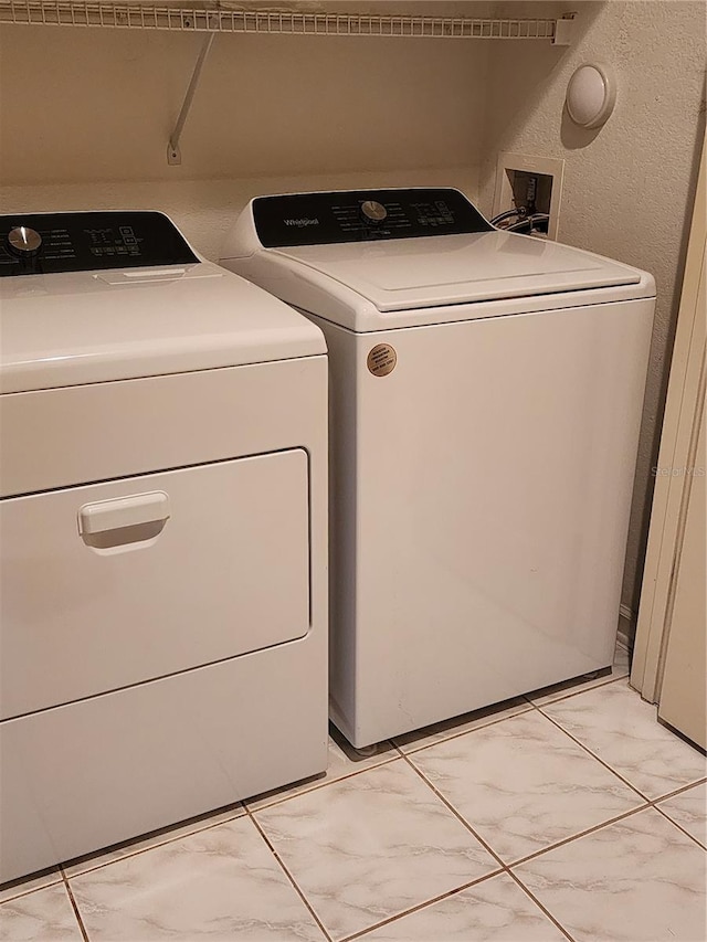 7135 Yacht Basin Ave Unit 237, Orlando, FL 32835 - washroom with washer and clothes dryer