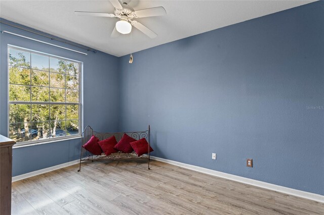 7135 Yacht Basin Ave Unit 237, Orlando, FL 32835 - unfurnished room with healthy amount of natural light, wood finished floors, and a ceiling fan
