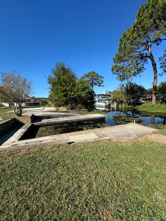 view of yard with a water view