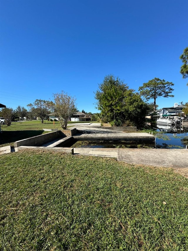 view of yard with a water view