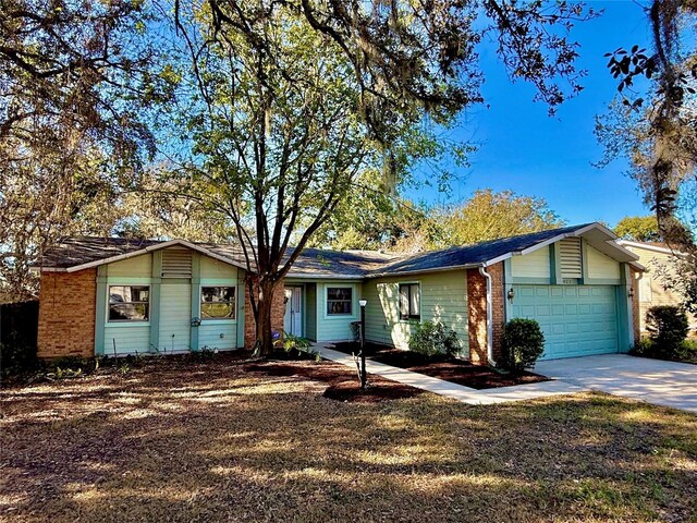 single story home with a garage