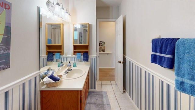 bathroom with vanity and tile patterned floors